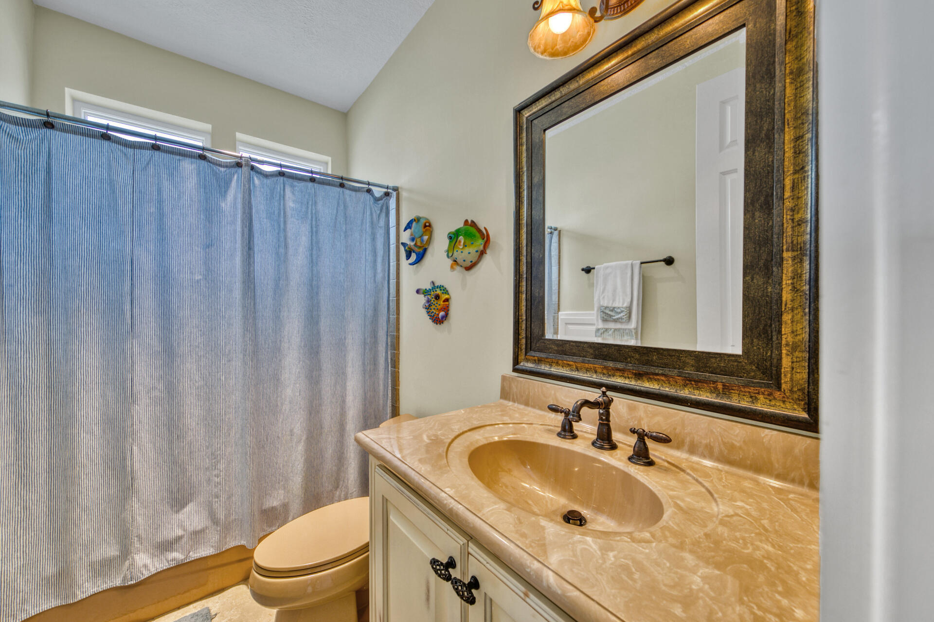 25 Pompano Place Inlet Beach, FL 32461 - Photo 42 of 76 a bathroom with a sink and a mirror