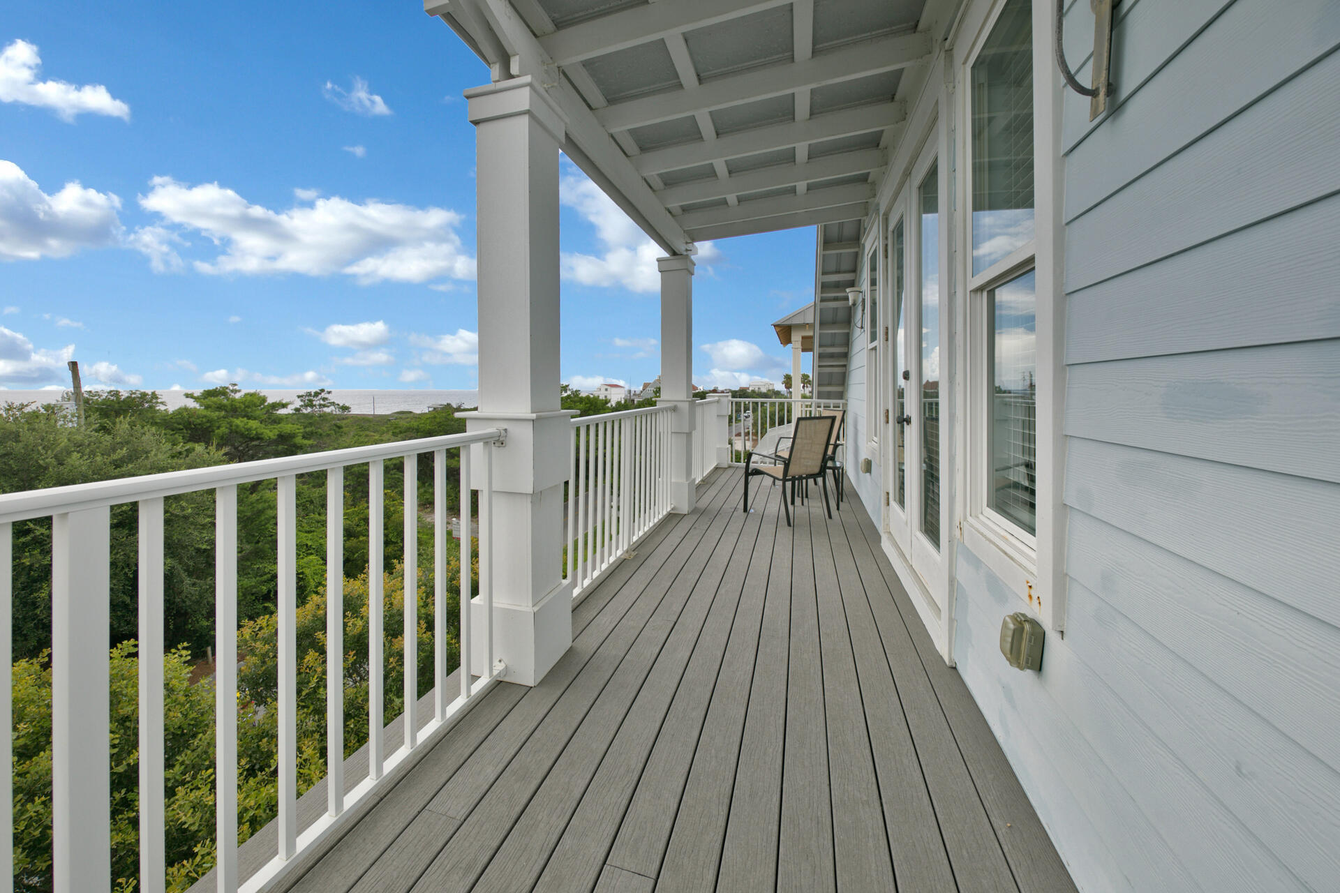 25 Pompano Place Inlet Beach, FL 32461 - Photo 46 of 76 a view of balcony with wooden floor and fence