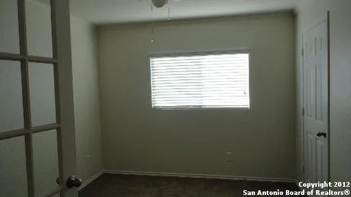 a view of a small space with a window