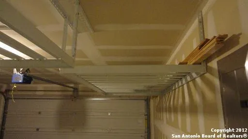 a bathroom with a shower and a mirror