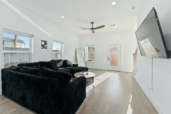 a living room with furniture and a window