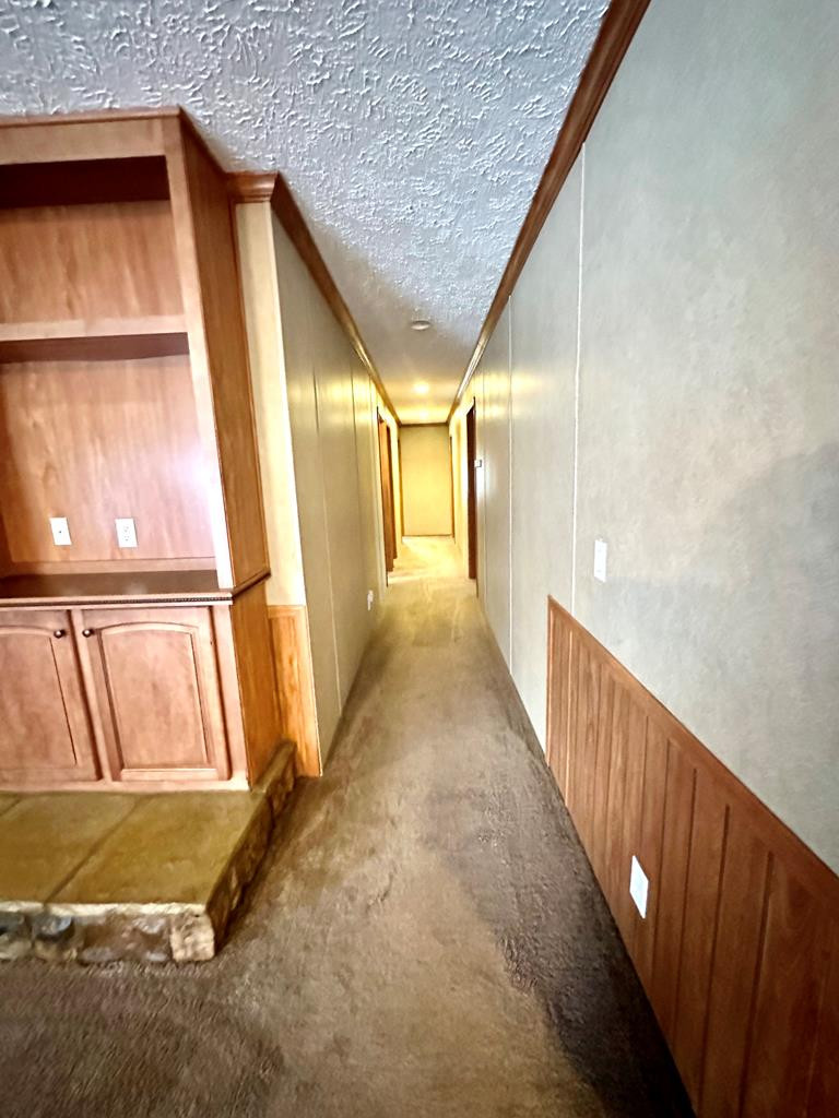 5090 Magnolia Progress Road Magnolia, MS 39652 - Photo 14 of 34 hallway leading to 3 bedrooms