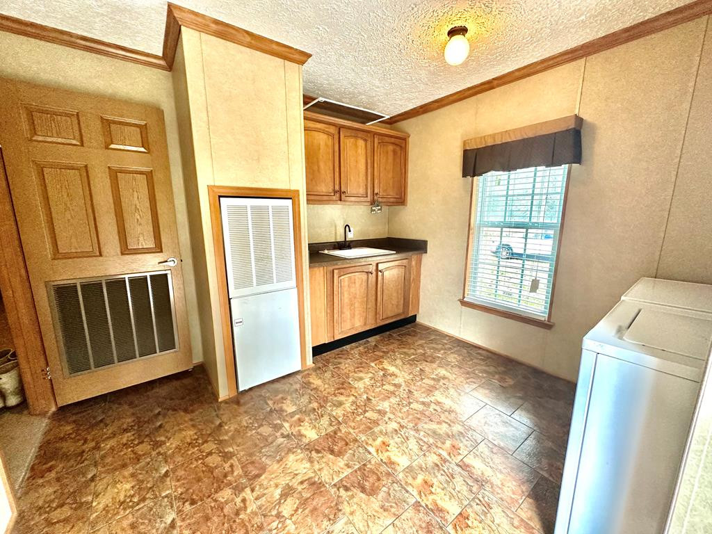 5090 Magnolia Progress Road Magnolia, MS 39652 - Photo 16 of 34 Laundry Room