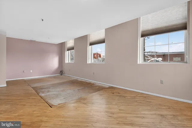 an empty room with windows