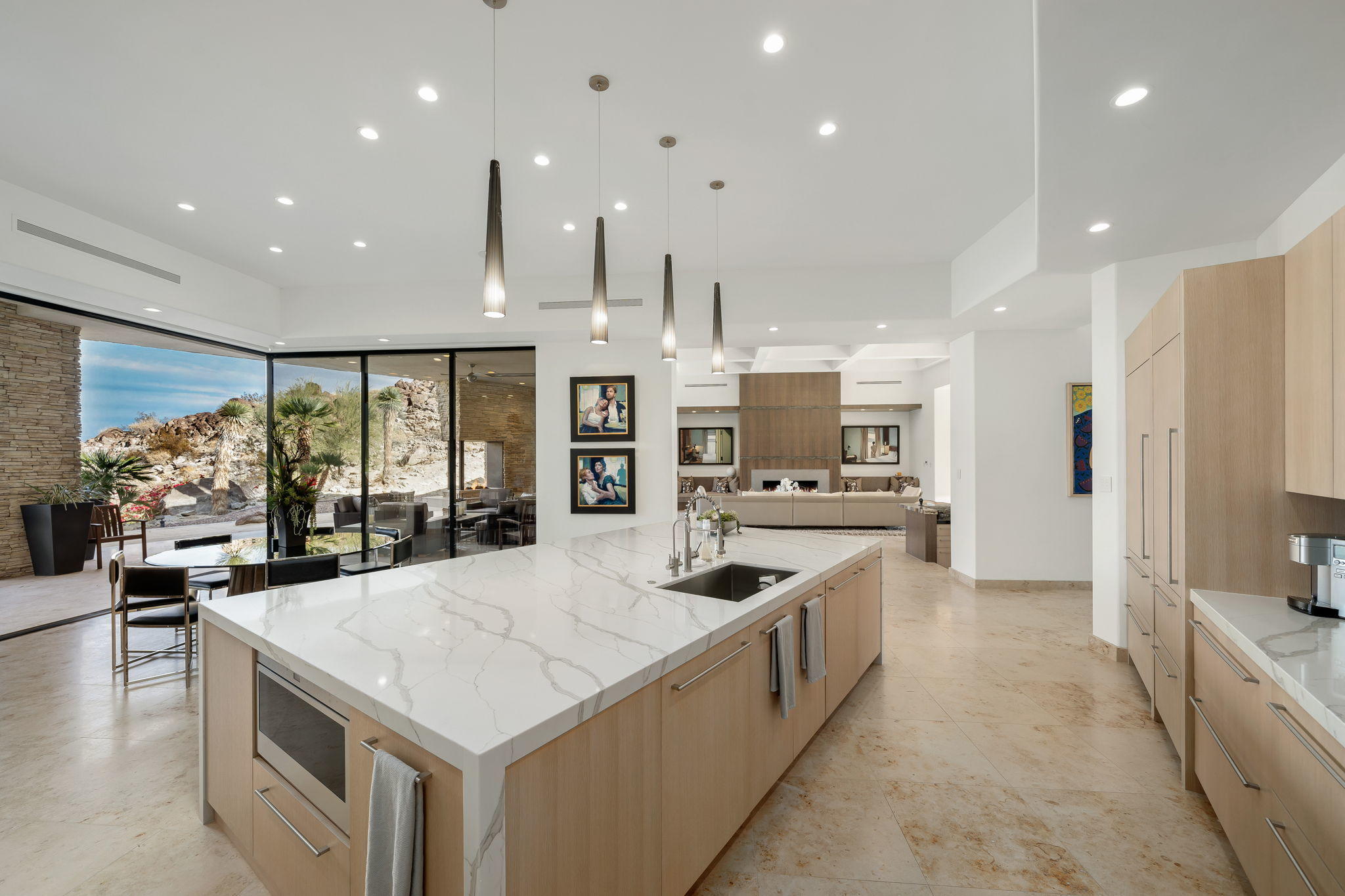 178 Netas Drive Palm Desert, CA 92260 - Photo 15 of 83 a kitchen with stainless steel appliances granite countertop a sink and a refrigerator