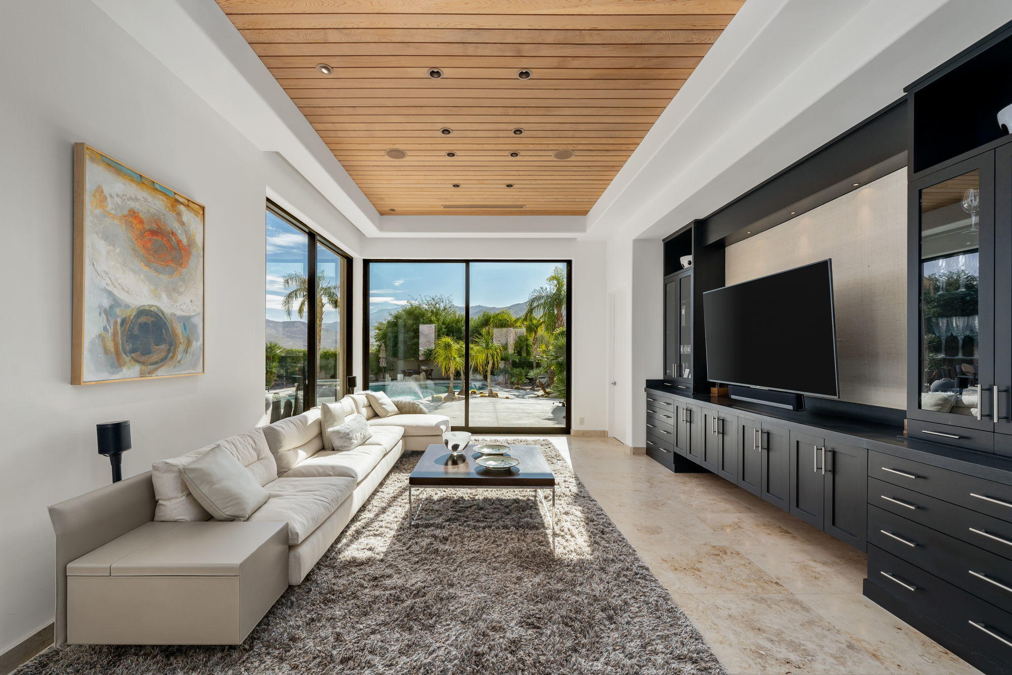 178 Netas Drive Palm Desert, CA 92260 - Photo 18 of 83 a living room with furniture and a flat screen tv