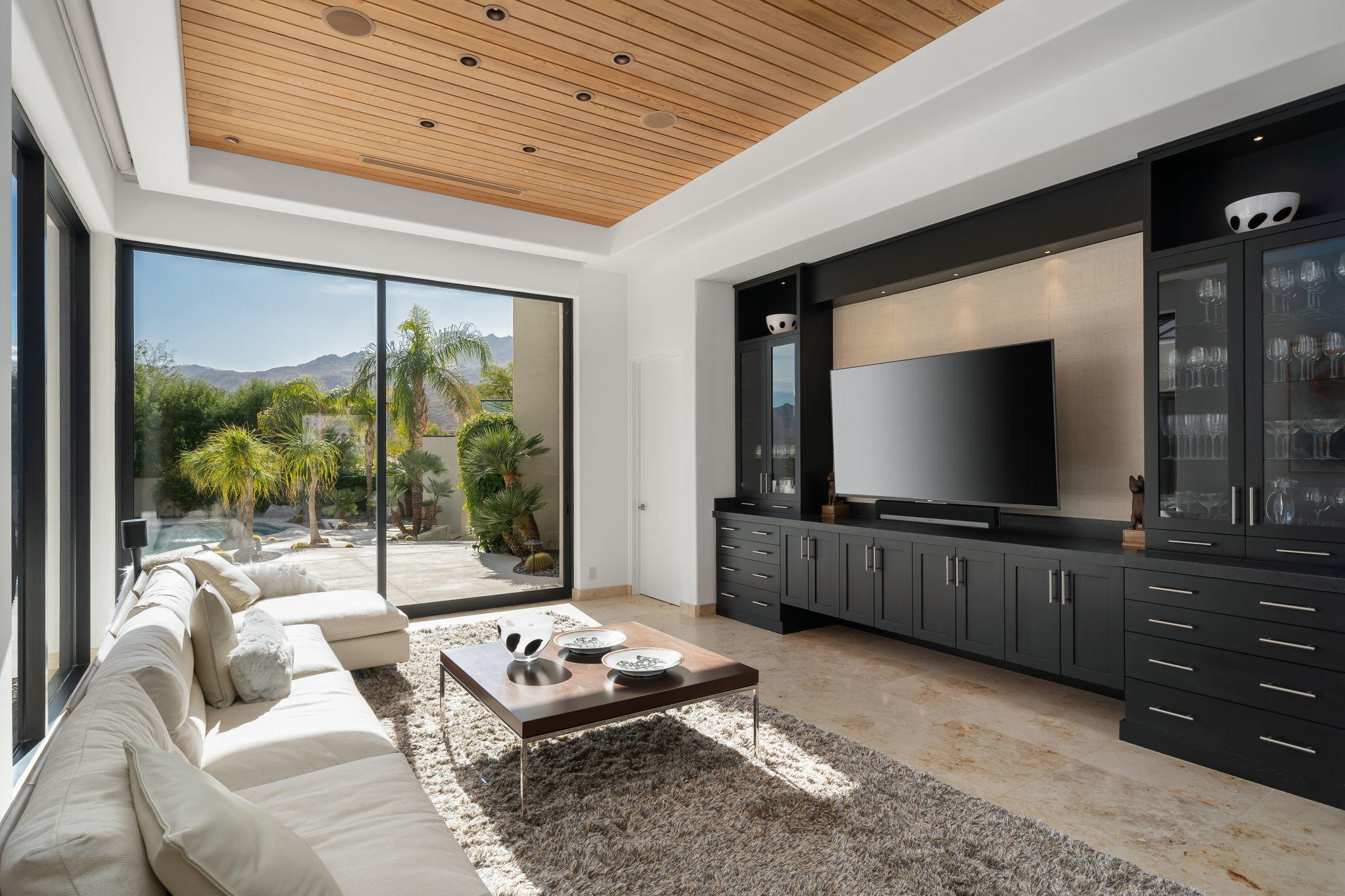 178 Netas Drive Palm Desert, CA 92260 - Photo 19 of 83 a living room with furniture and a flat screen tv