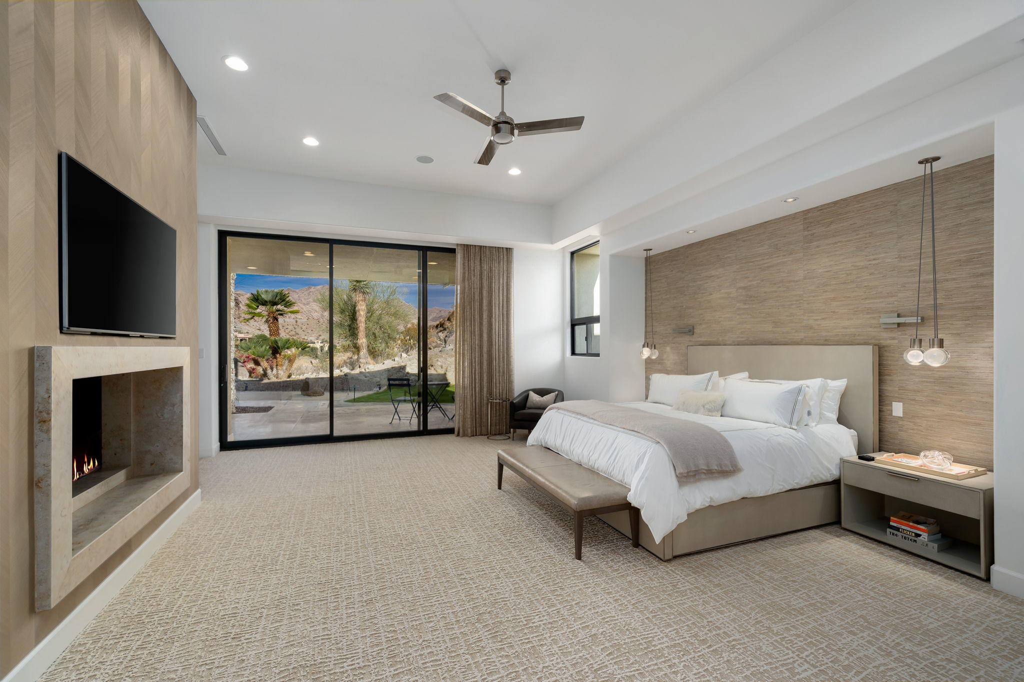 178 Netas Drive Palm Desert, CA 92260 - Photo 22 of 83 a spacious bedroom with a bed and a fireplace