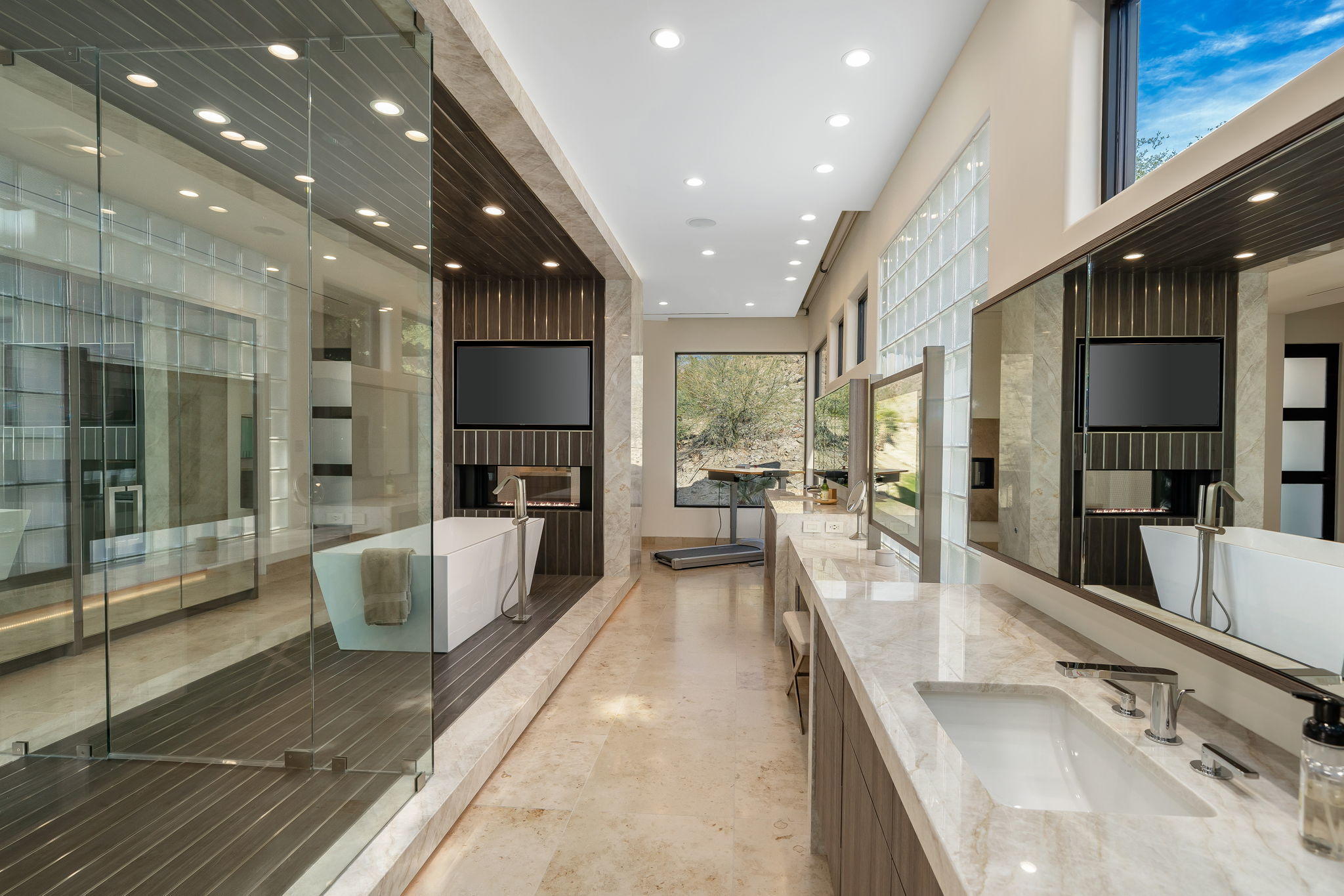 178 Netas Drive Palm Desert, CA 92260 - Photo 27 of 83 a large white kitchen with a large window and stainless steel appliances