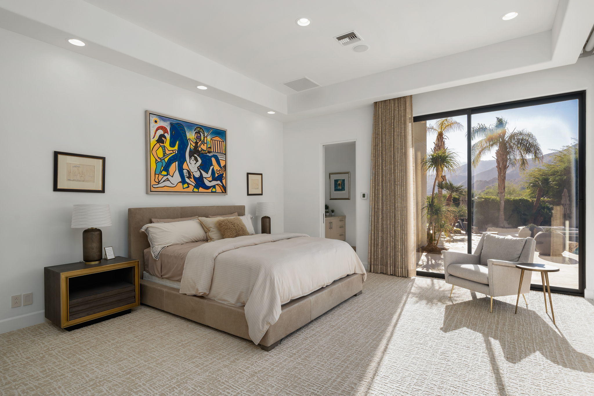 178 Netas Drive Palm Desert, CA 92260 - Photo 30 of 83 a spacious bedroom with a large bed and a large window