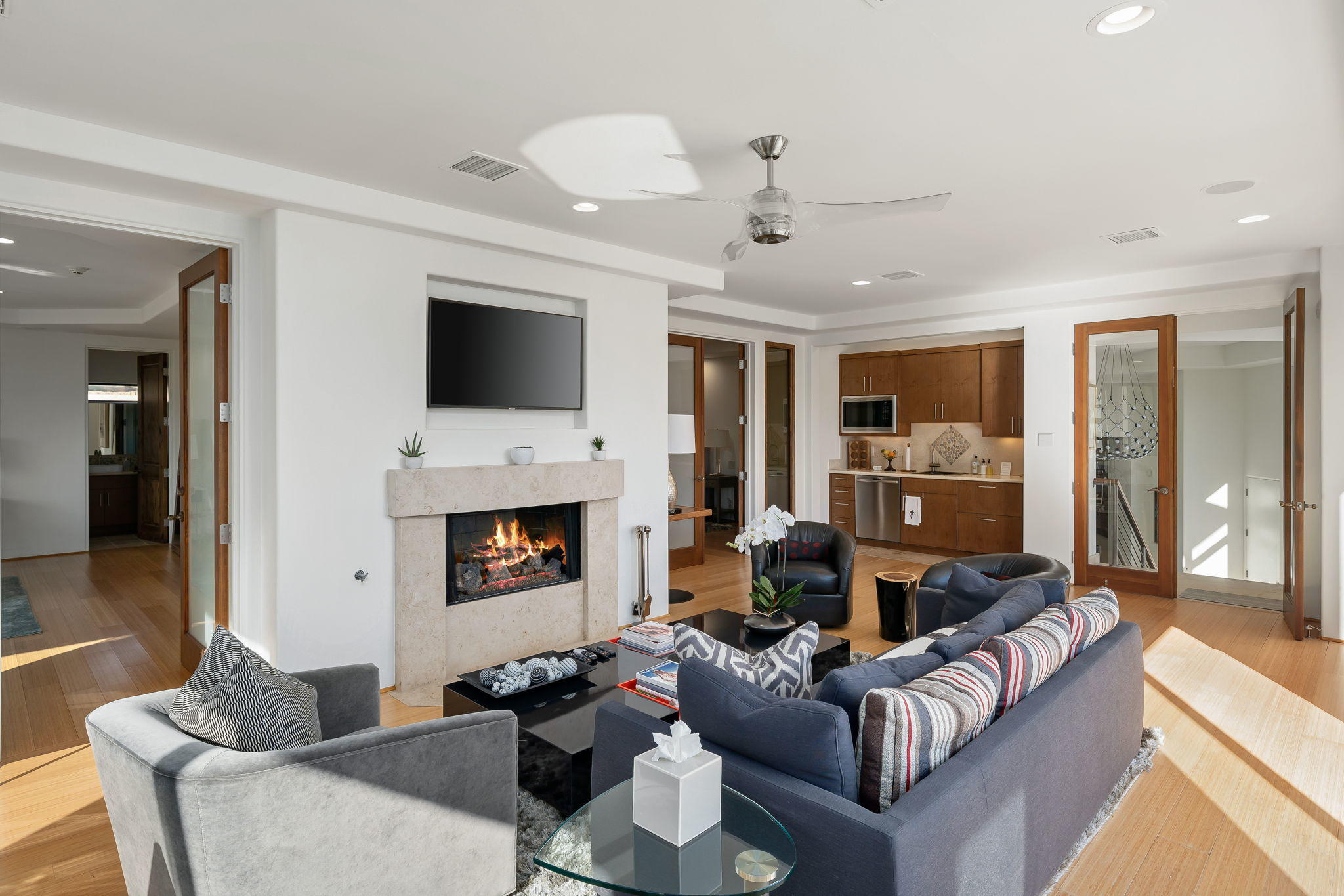 178 Netas Drive Palm Desert, CA 92260 - Photo 37 of 83 a living room with furniture a fireplace and a flat screen tv