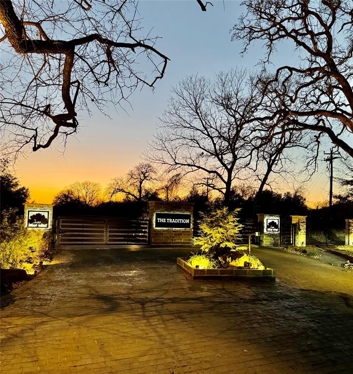 547 Tradition Way Granbury, TX 76049 - Photo 2 of 5 a view of a swimming pool with potted plants and large tree