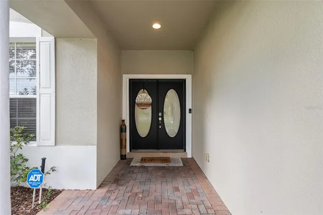 a view of entryway with wooden floor