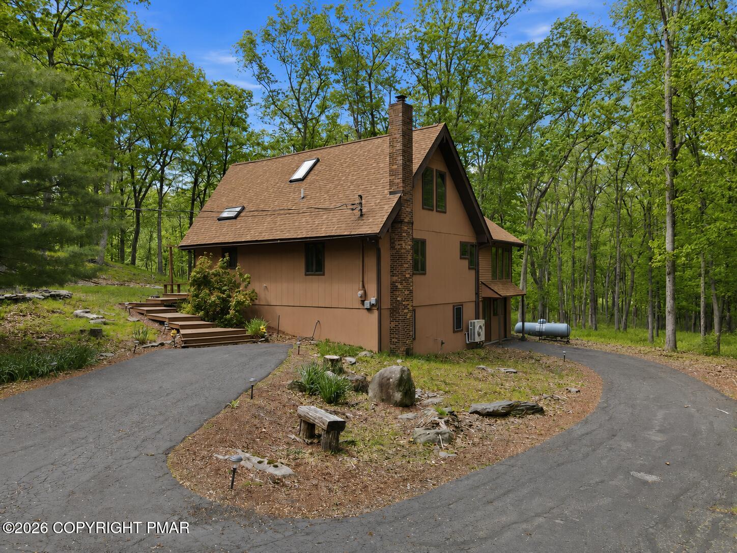 1517 Deer Run East Bushkill, PA 18324 - Photo 3 of 42 a view of a house with backyard and sitting area