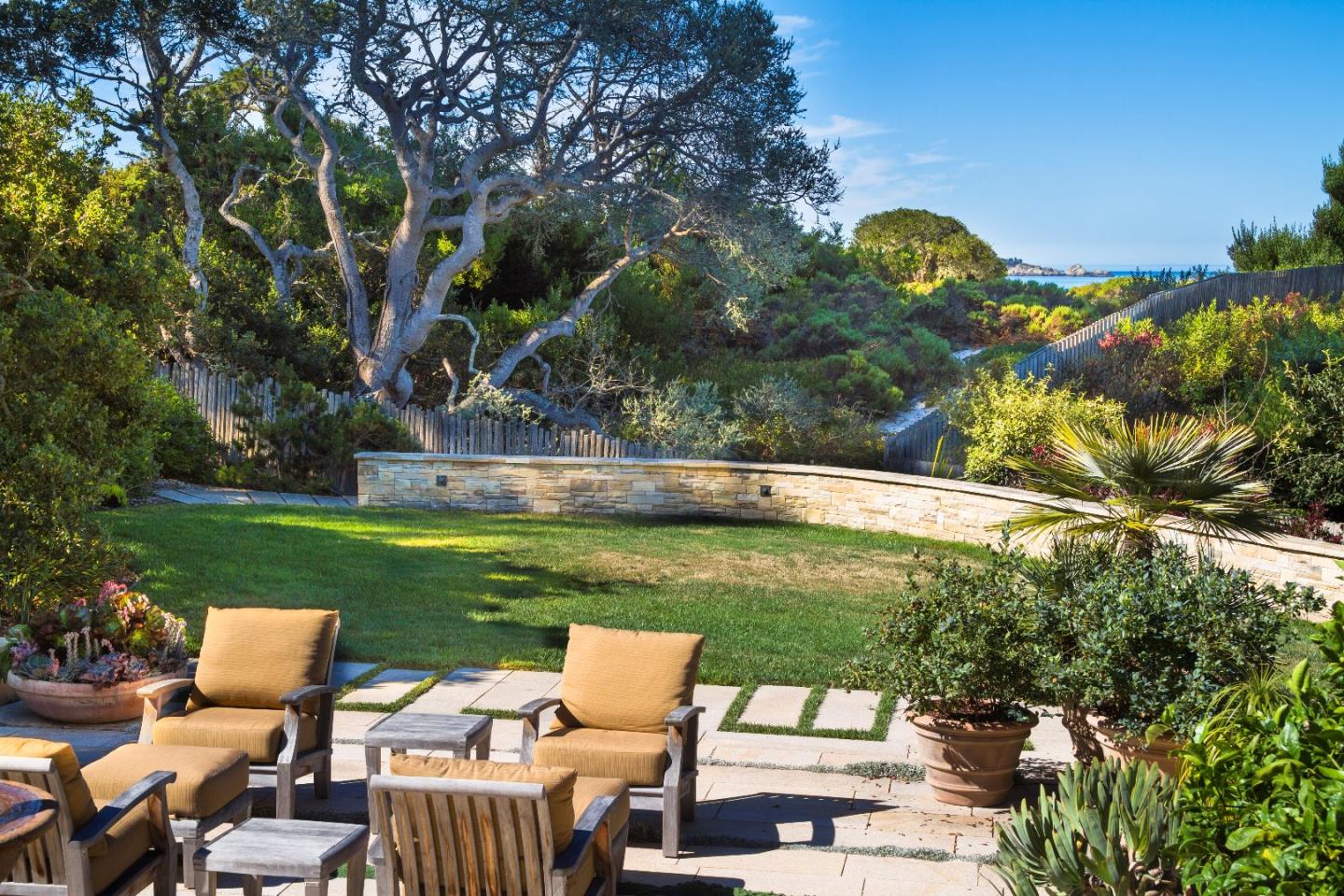 8 Carmel Way Carmel, CA 93923 - Photo 14 of 15 a view of a chairs and table in the garden