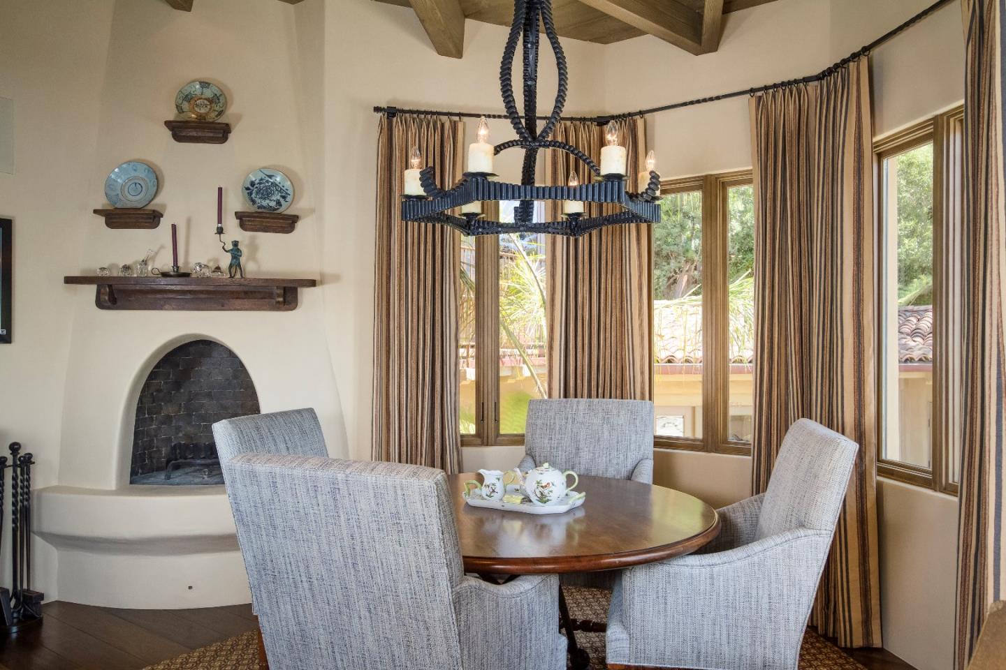 8 Carmel Way Carmel, CA 93923 - Photo 6 of 15 a living room with furniture and a large window