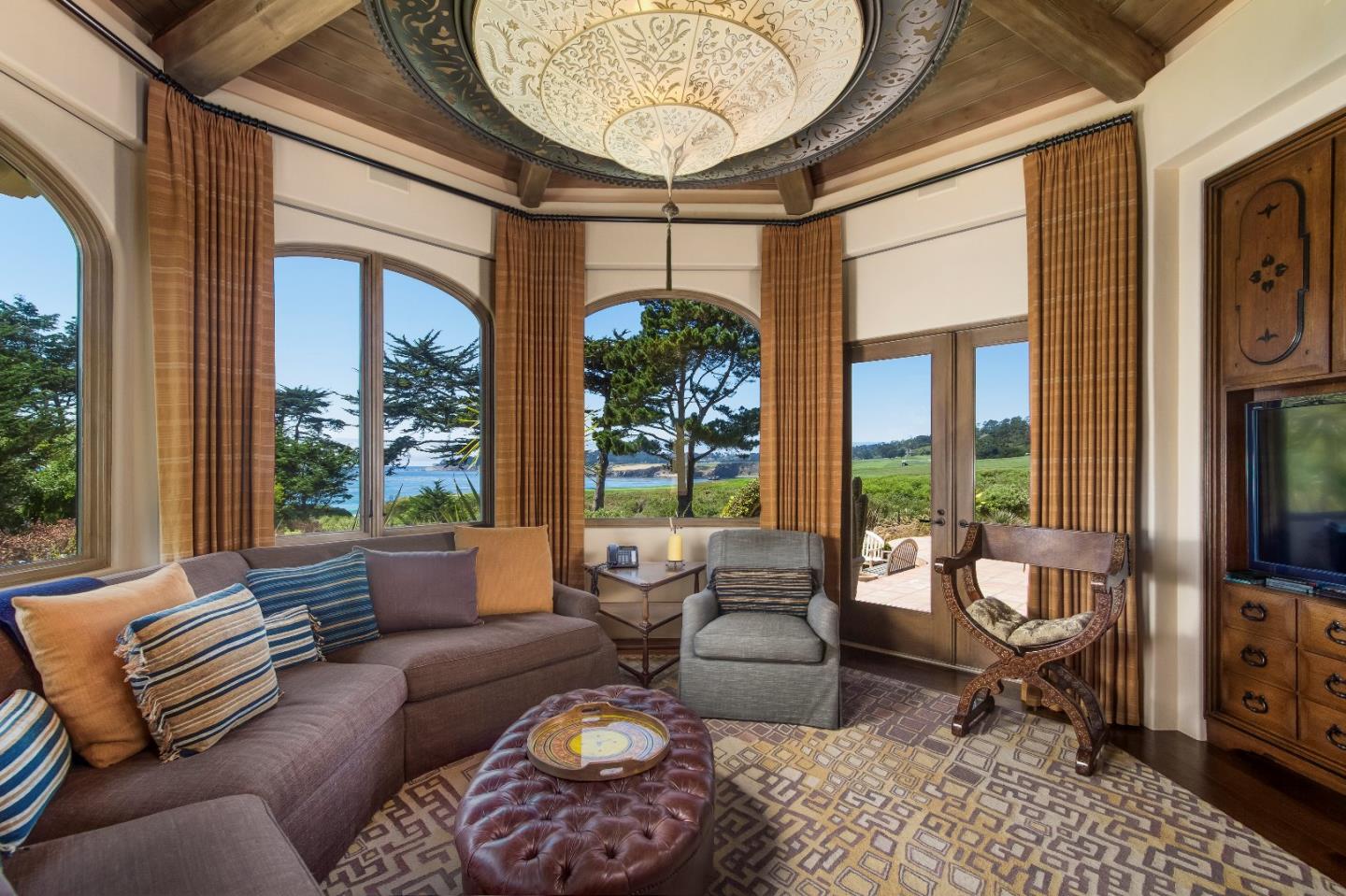 8 Carmel Way Carmel, CA 93923 - Photo 7 of 15 a living room with furniture and a large window