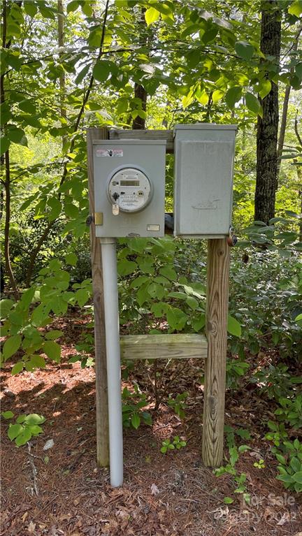 Lot 6 Fox Ridge Trail, Unit 6 Marion, NC 28752 - Photo 2 of 20 a front view of a house with a tree