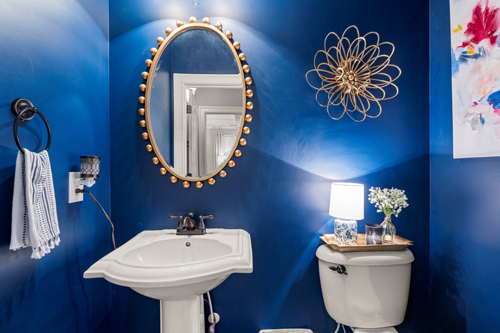 8014 Splendor Way Columbus, GA 31904 - Photo 13 of 58 a bathroom with a sink and a mirror