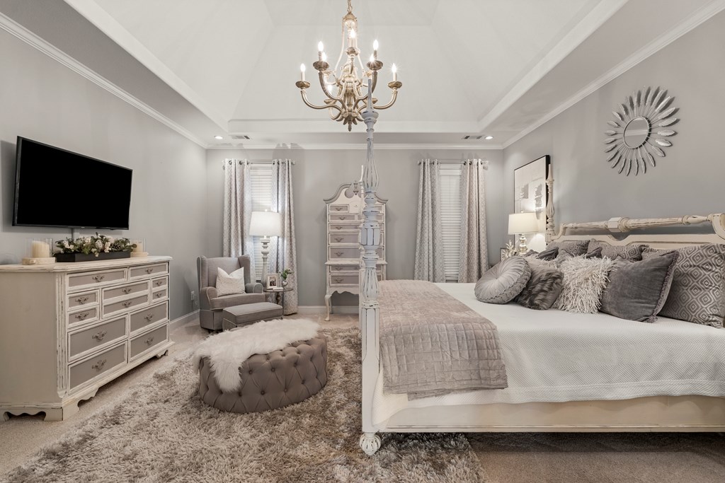 8014 Splendor Way Columbus, GA 31904 - Photo 15 of 58 a bedroom with a bed and a flat screen tv