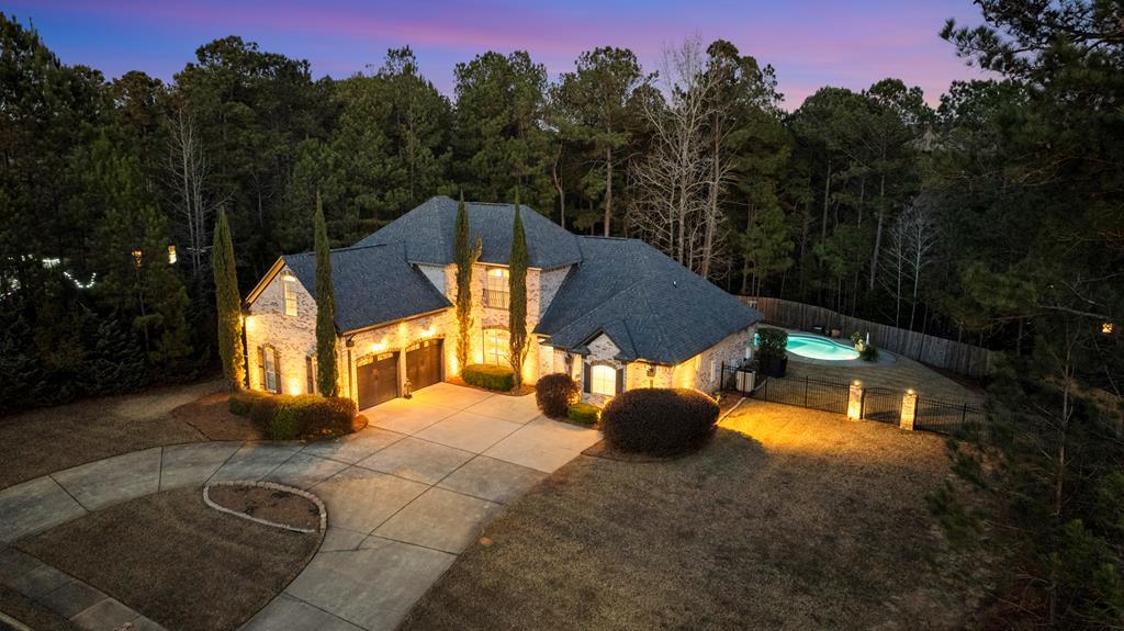 8014 Splendor Way Columbus, GA 31904 - Photo 2 of 58 a view of a house with backyard and trees
