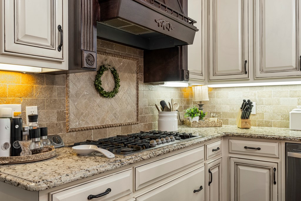 8014 Splendor Way Columbus, GA 31904 - Photo 26 of 58 a kitchen with granite countertop stainless steel appliances stove and cabinets