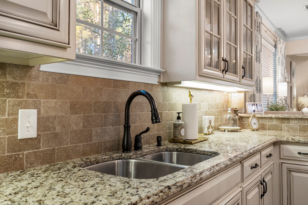 8014 Splendor Way Columbus, GA 31904 - Photo 28 of 58 a close view of a sink a faucet and a sink in a bathroom