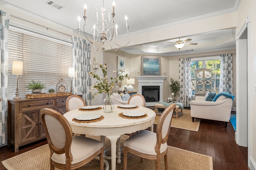8014 Splendor Way Columbus, GA 31904 - Photo 29 of 58 a view of a dining room with furniture window and wooden floor