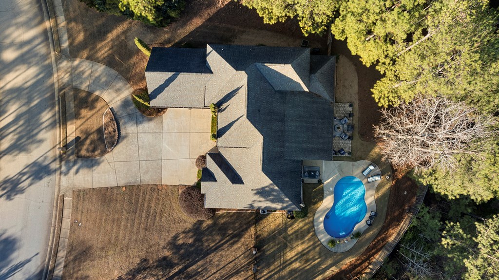 8014 Splendor Way Columbus, GA 31904 - Photo 4 of 58 an aerial view of a house with swimming pool and wooden fence