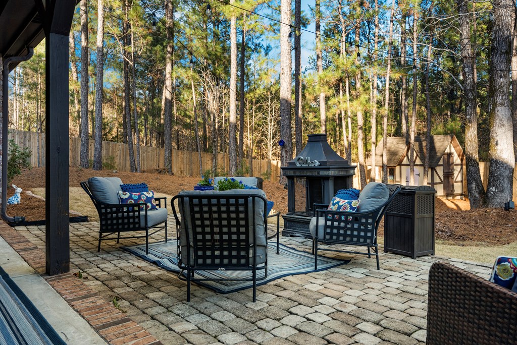 8014 Splendor Way Columbus, GA 31904 - Photo 46 of 58 a view of a chairs and table in backyard