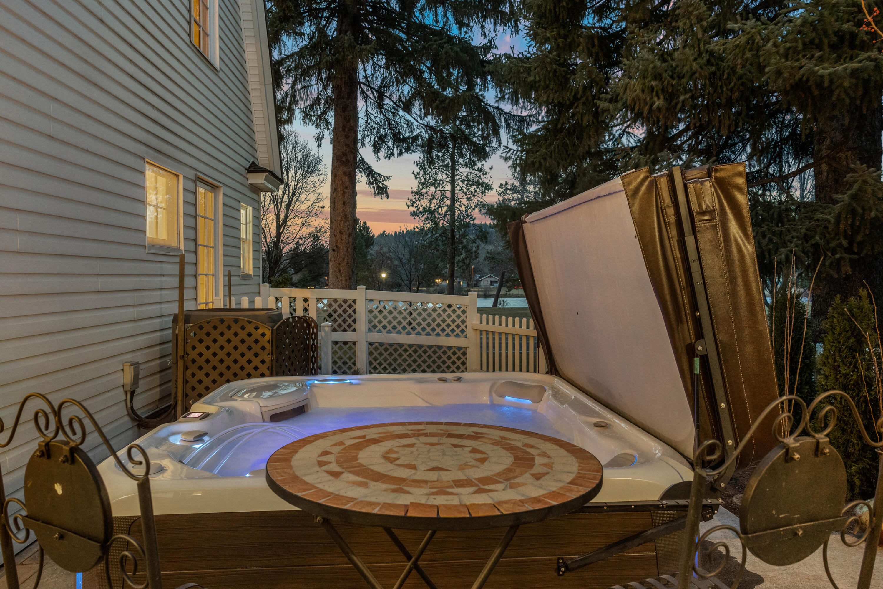 708 Northwest Riverside Boulevard Bend, OR 97703 - Photo 42 of 51 Private hot-tub spa patio with Drake Park and Deschutes River views