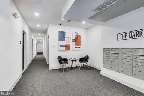 a view of a livingroom with furniture
