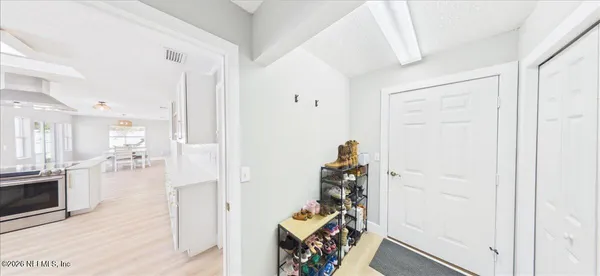 an aerial view of a house with a garden