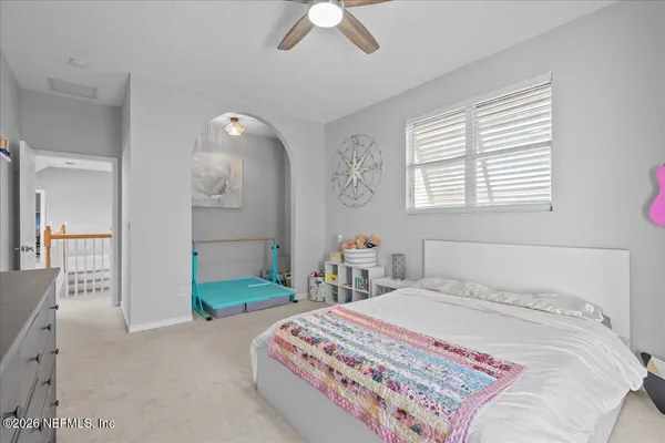 an aerial view of residential building and ocean