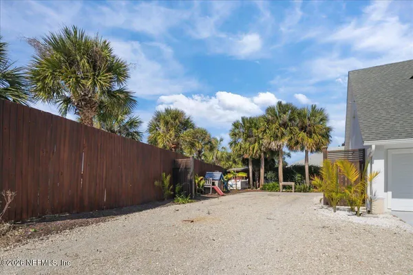 a view of storage and utility room with washer and dryer