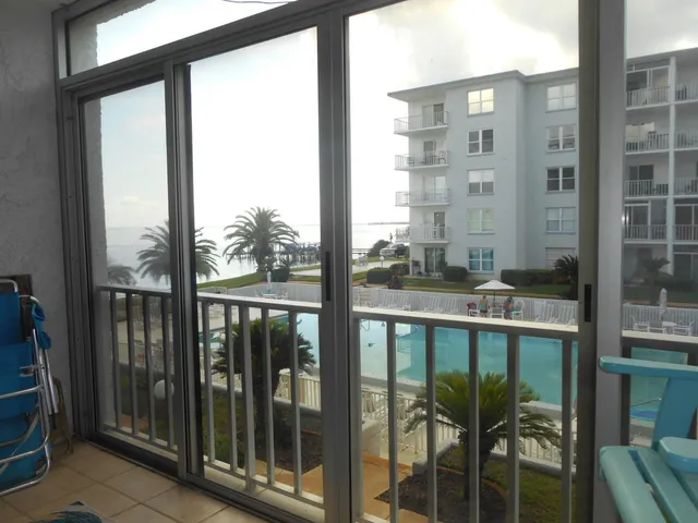 a view of a hallway with a room