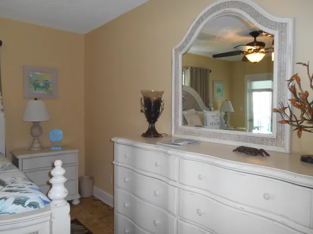 a view of a lake with a building in the background