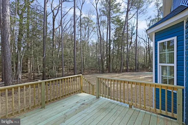 a view of balcony with wooden floor