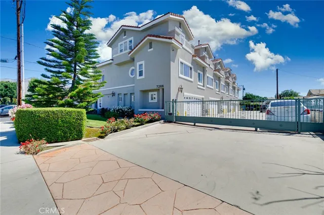 a view of a building with a yard