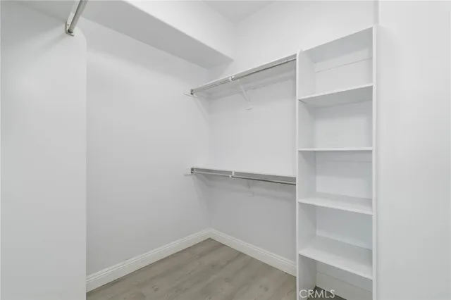 a view of an empty walk in closet