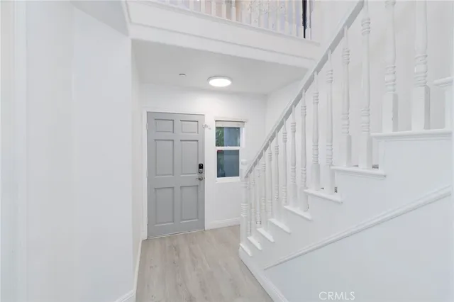 a view of entryway with stairs