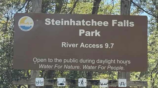 a view of a lake with mountain