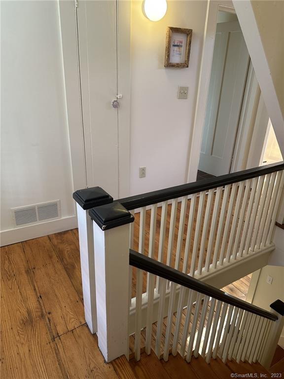 14 Quassuk Road, Unit 14 Woodbury, CT 06798 - Photo 12 of 23 a view of a balcony with wooden floor