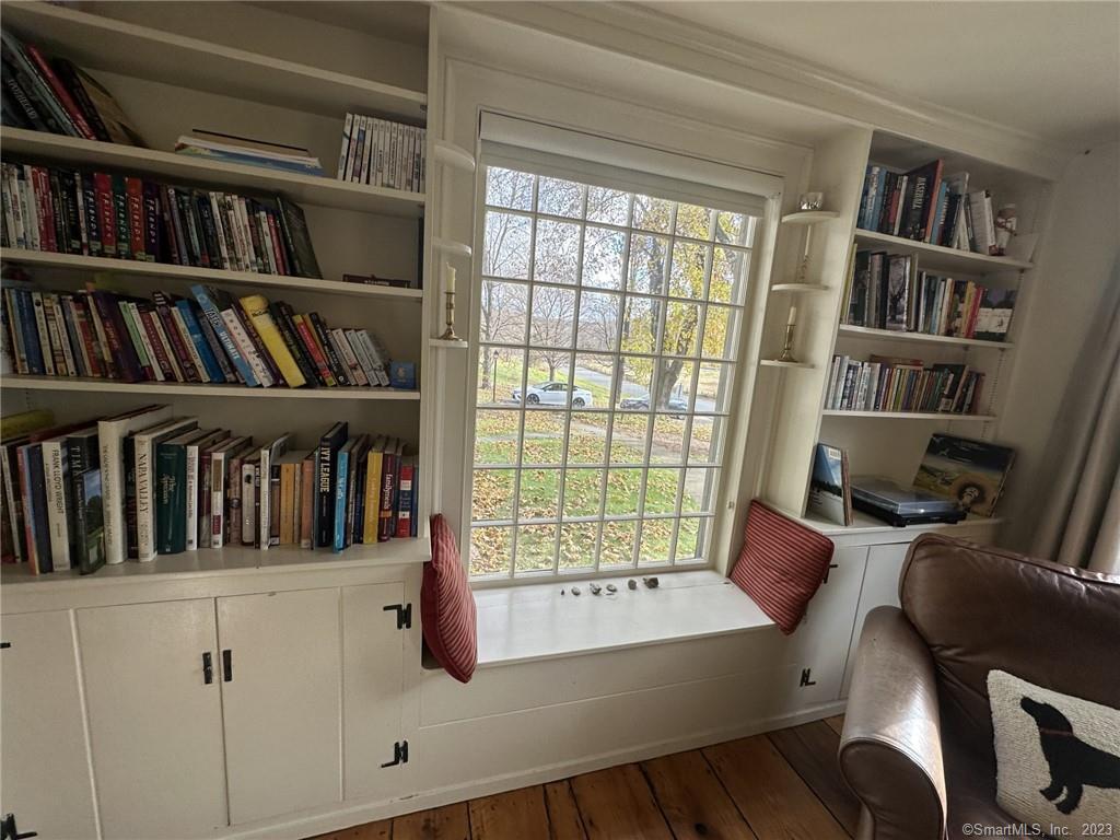 14 Quassuk Road, Unit 14 Woodbury, CT 06798 - Photo 10 of 23 a view of a book shelf with a book shelf