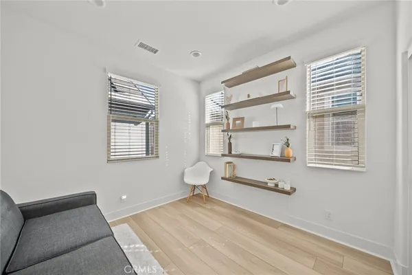 a room with a couch and a window