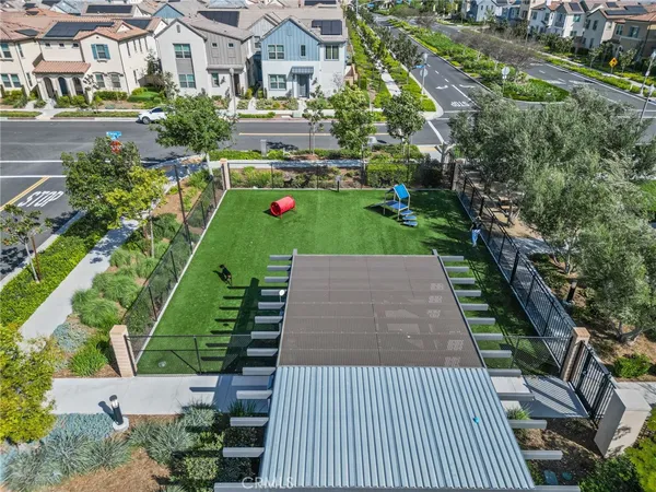 a view of a swimming pool with outdoor seating and yard