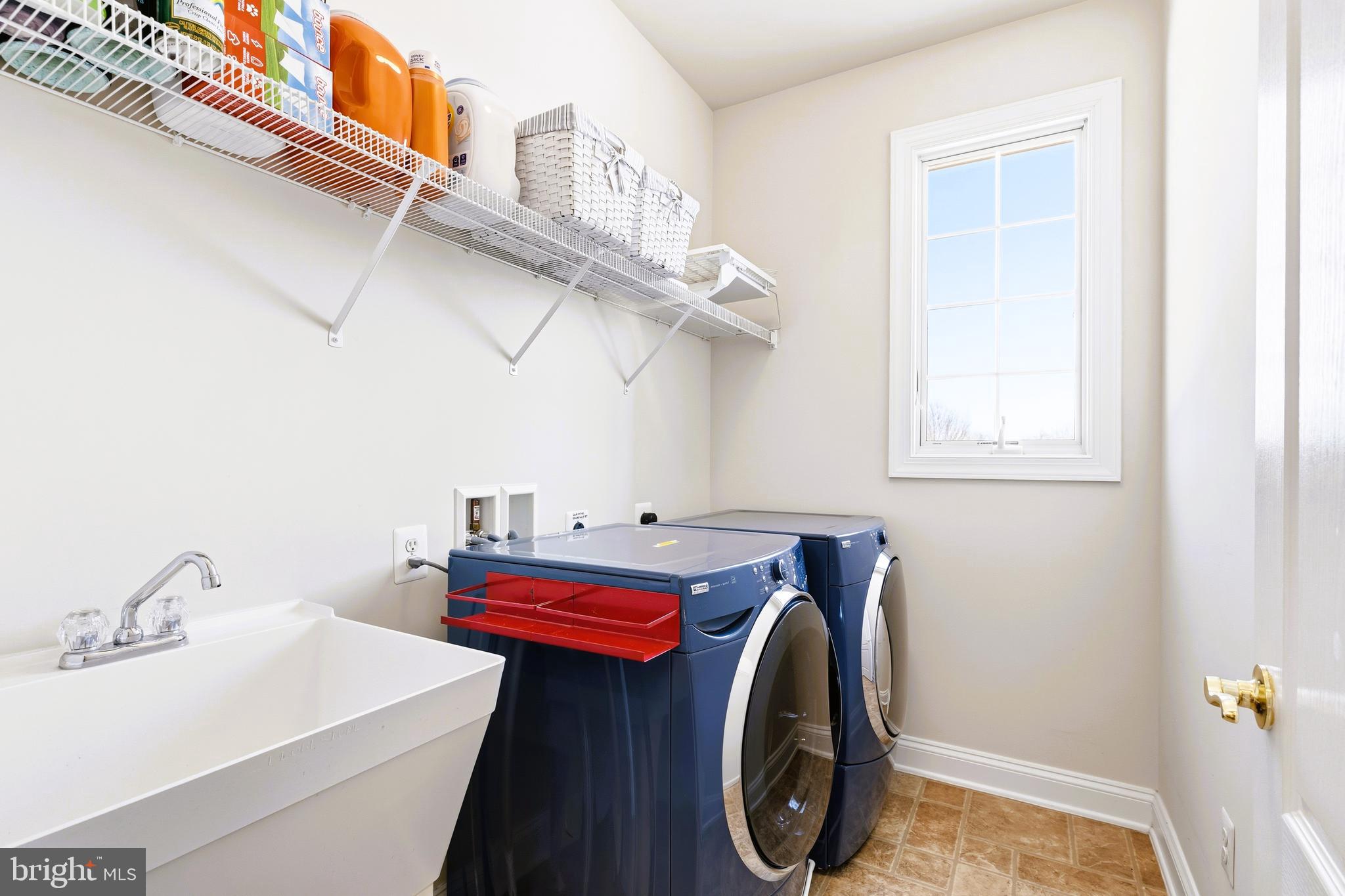 19606 Bellingham Lane Leesburg, VA 20175 - Photo 50 of 73 a utility room with dryer and washer