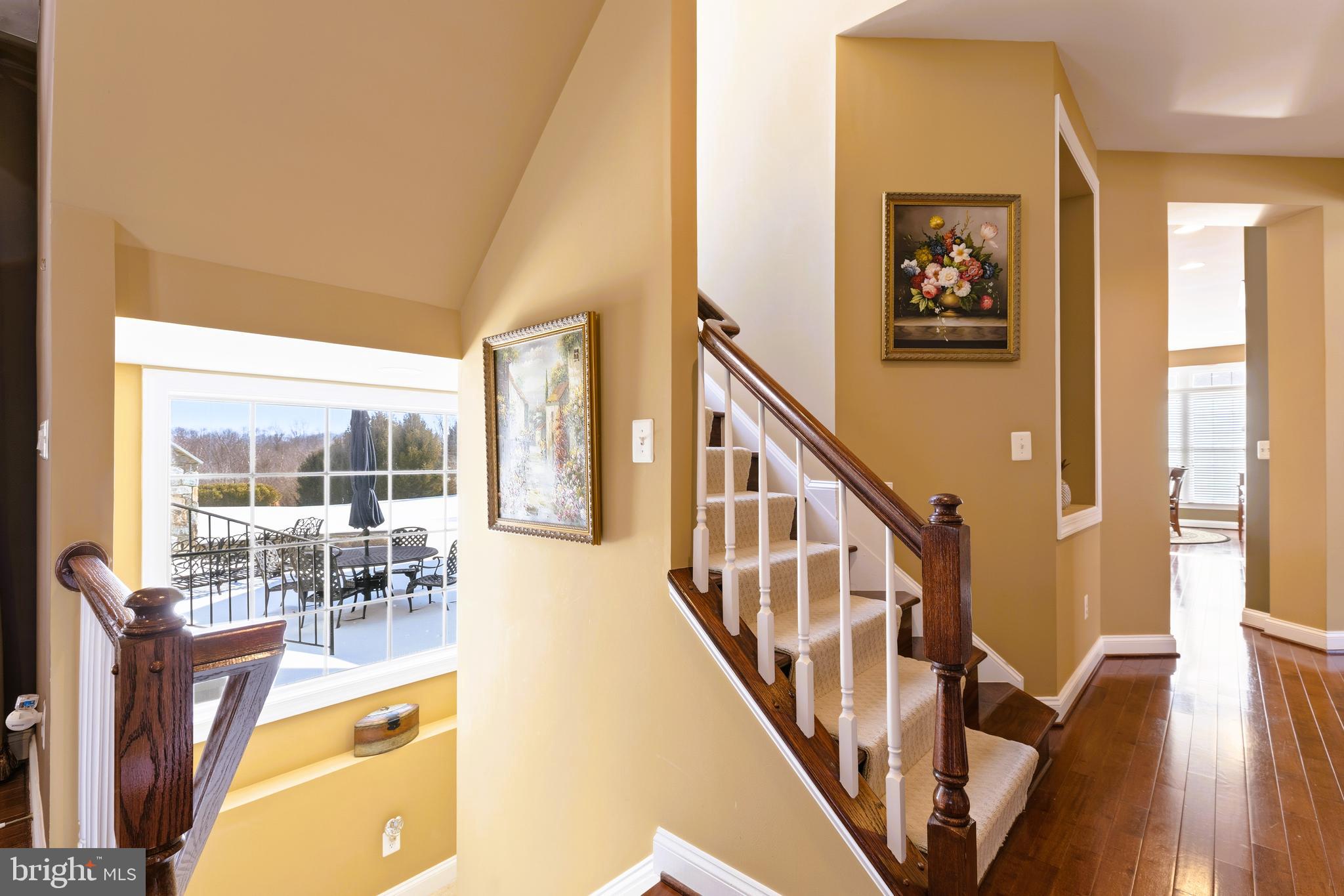 19606 Bellingham Lane Leesburg, VA 20175 - Photo 51 of 73 a view of a livingroom with furniture wooden floor and windows