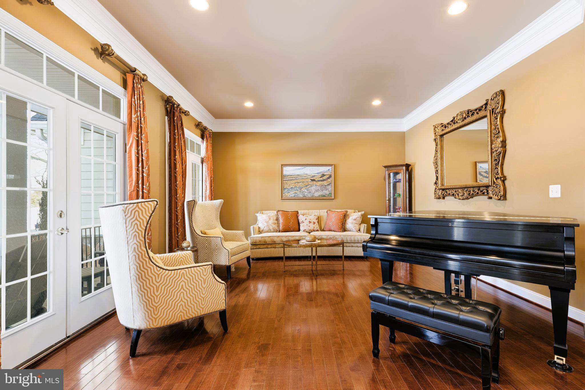 19606 Bellingham Lane Leesburg, VA 20175 - Photo 8 of 73 a living room with furniture and a piano