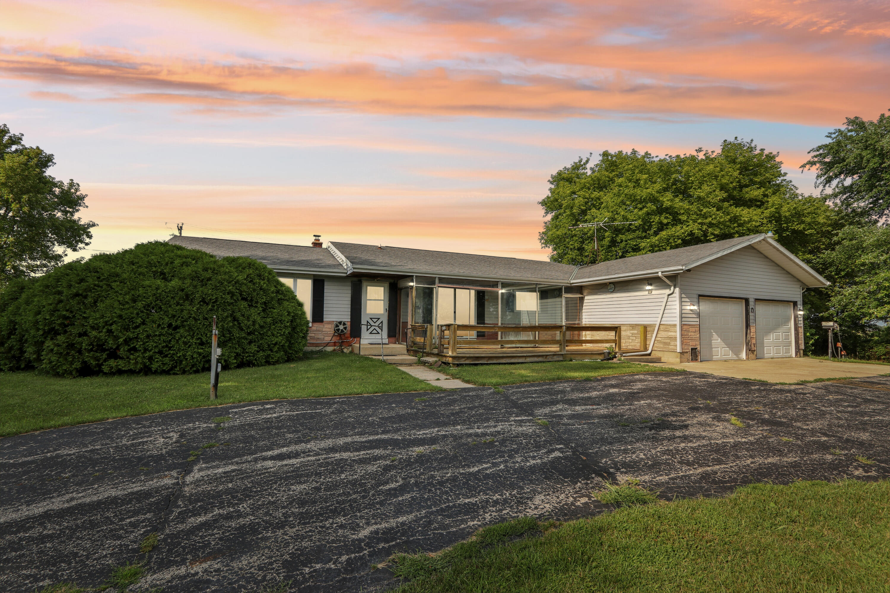 6336 County Highway Allenton, WI 53002 - Photo 1 of 1 When the sun dips low and the sky turns gold, this country ranch shows off its glow—small-town soul with big-sky views